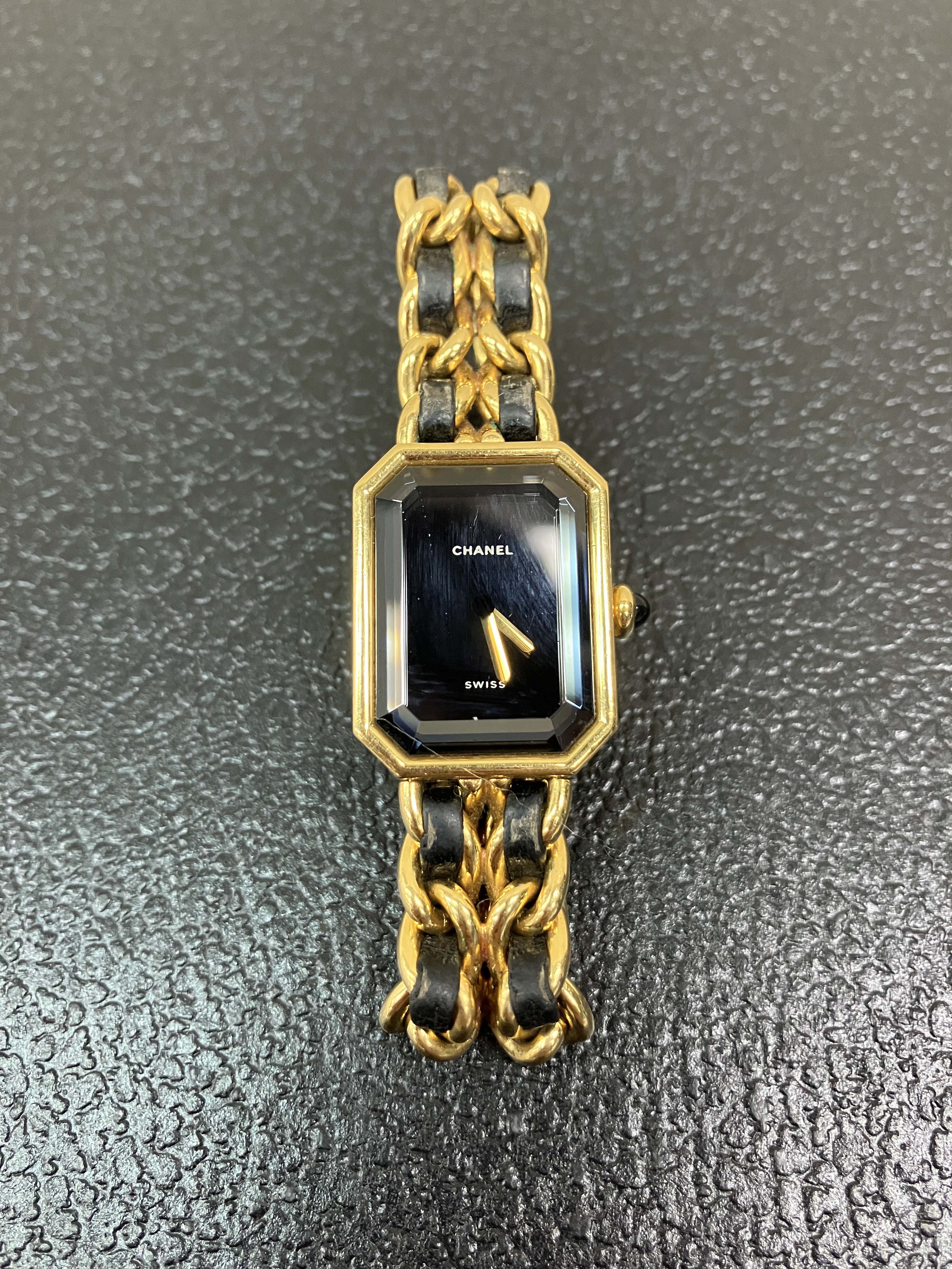 Chanel gold and leather watch Mademoiselle